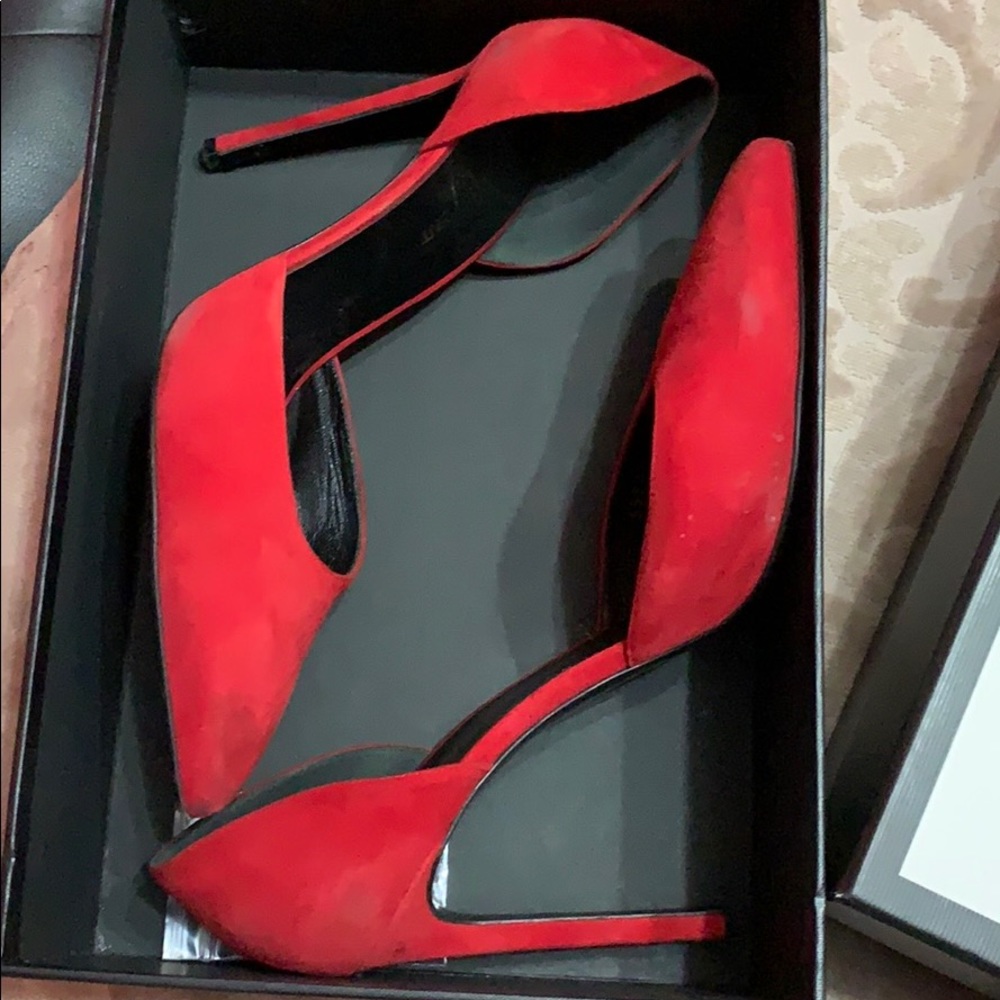 Beautiful YSL pumps in red. gently worn